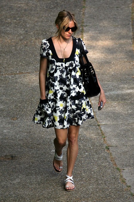 Sienna Miller was spotted walking into summer in this summery floral print